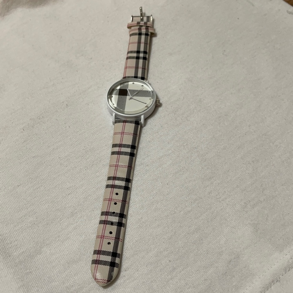 D&S watch. Pink with black stripes